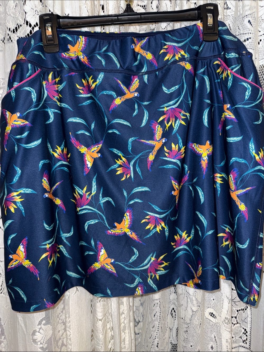 Coolibar Navy Swim Skirt with Bright Tropical Print